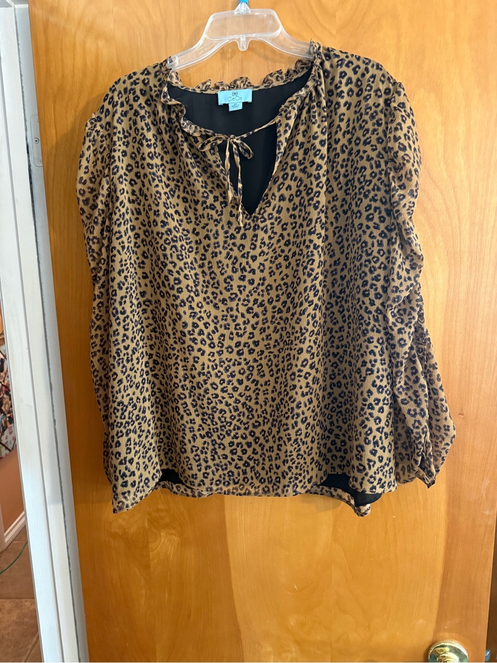CeCe Leopard Print Tie-Neck Blouse in Brown and Black